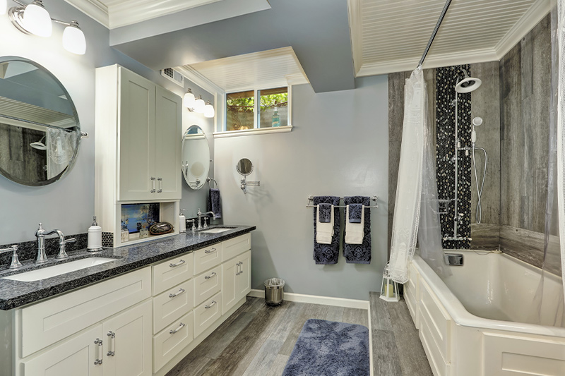 a clean and shiny bathroom after a bathroom repair