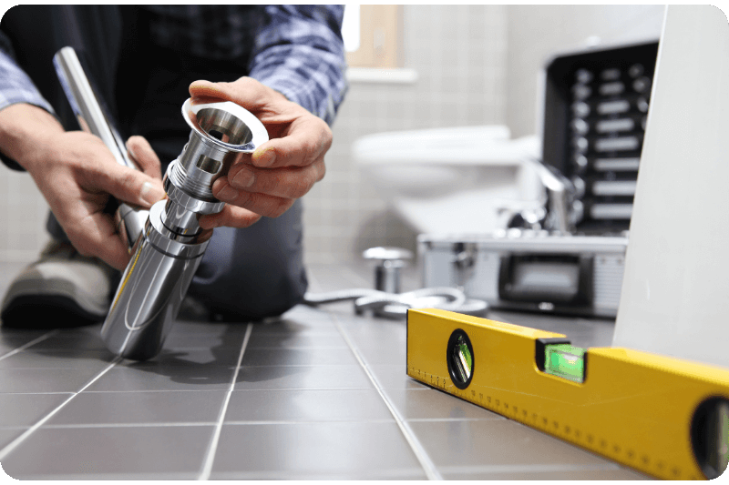 plumber working on floor